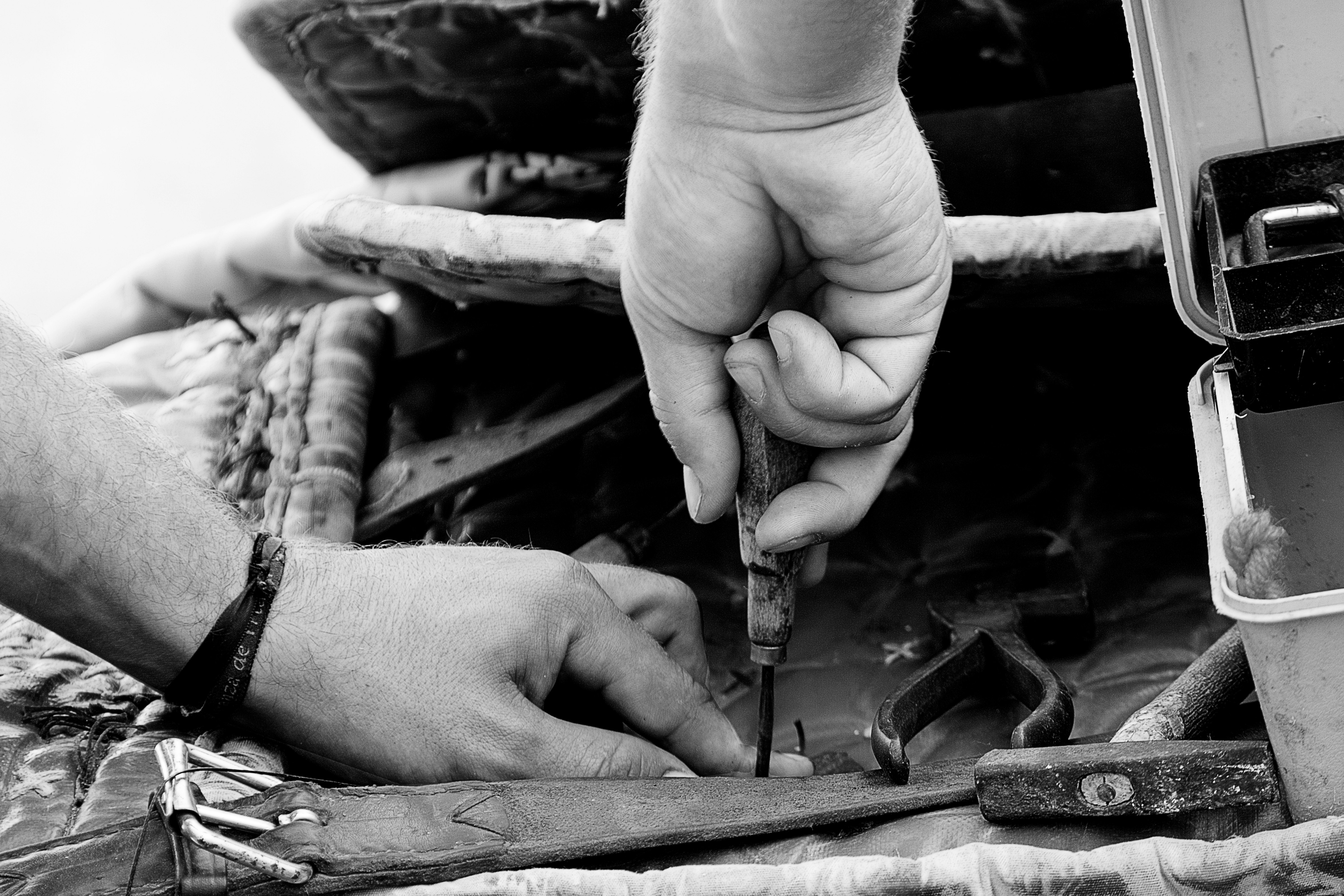 person holding a hand tool